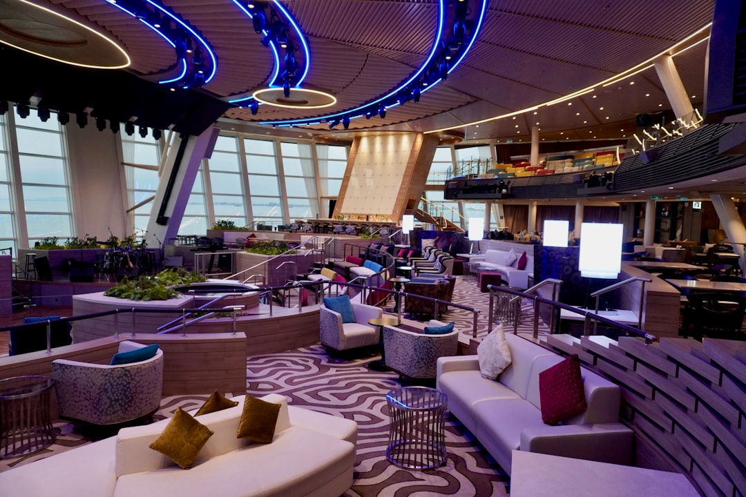 a room with a lot of chairs and tables,
