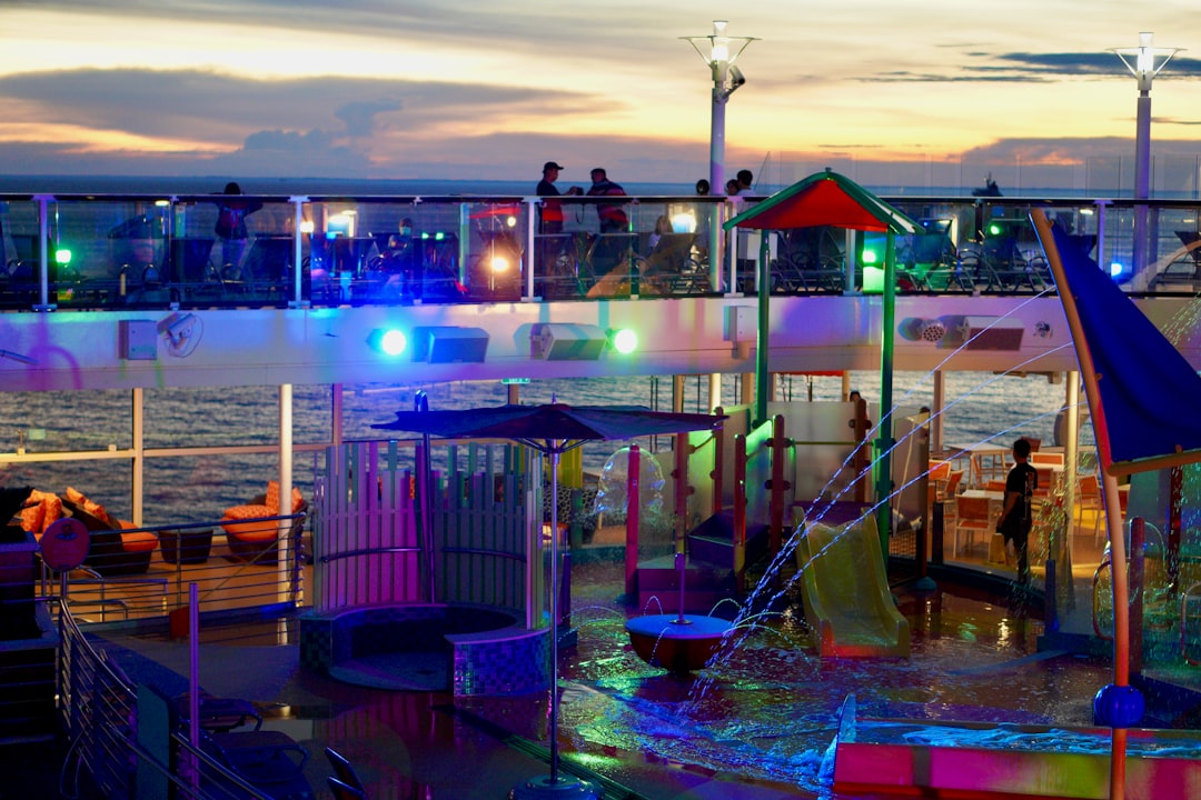 a group of people on a dock,