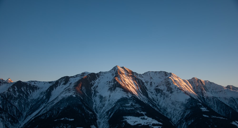 a mountain with snow