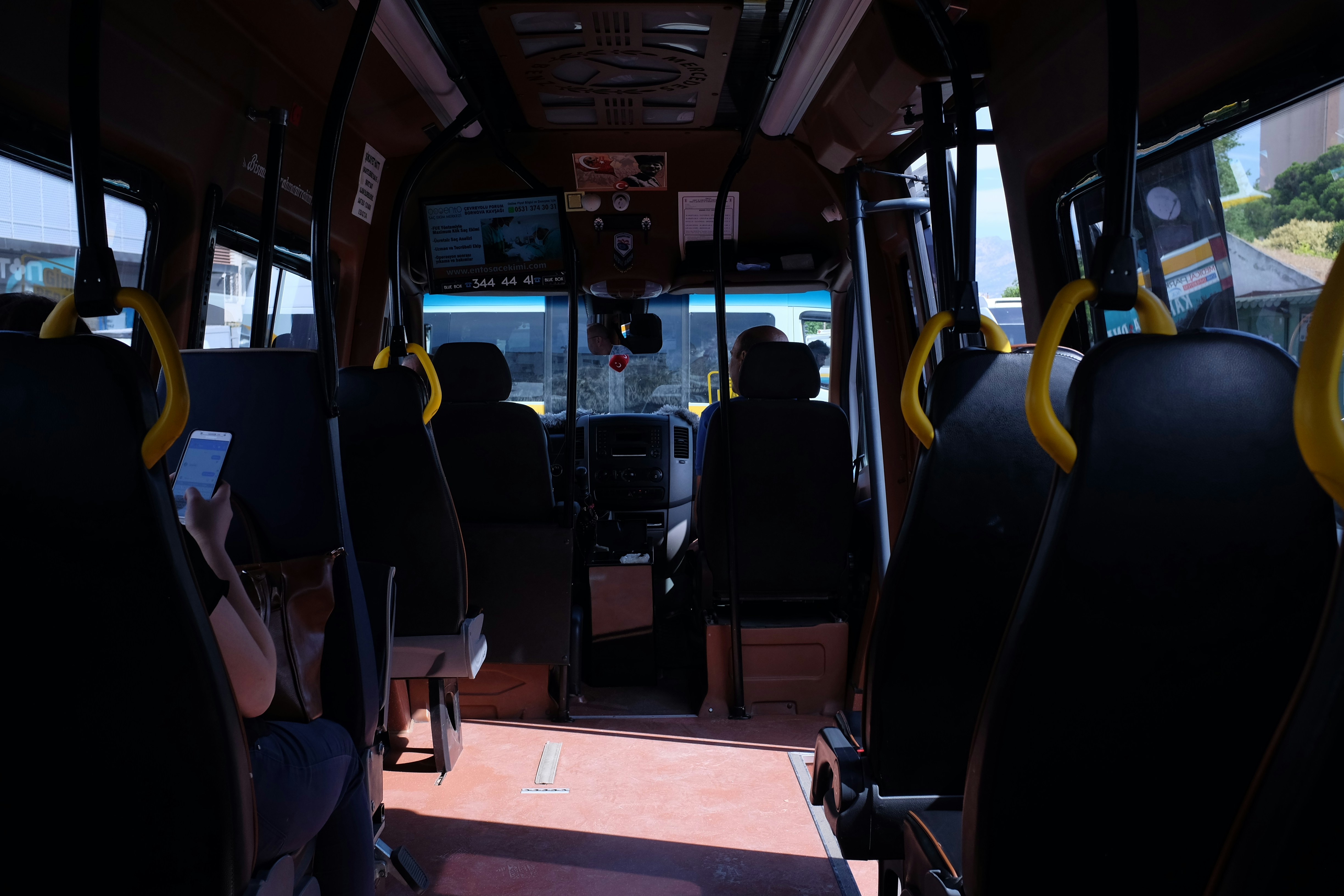 a bus driver training a new employee