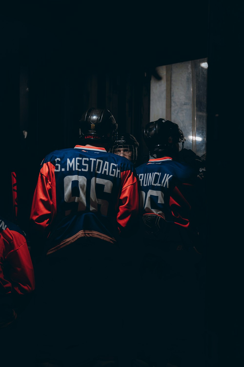 a group of people wearing hockey uniforms