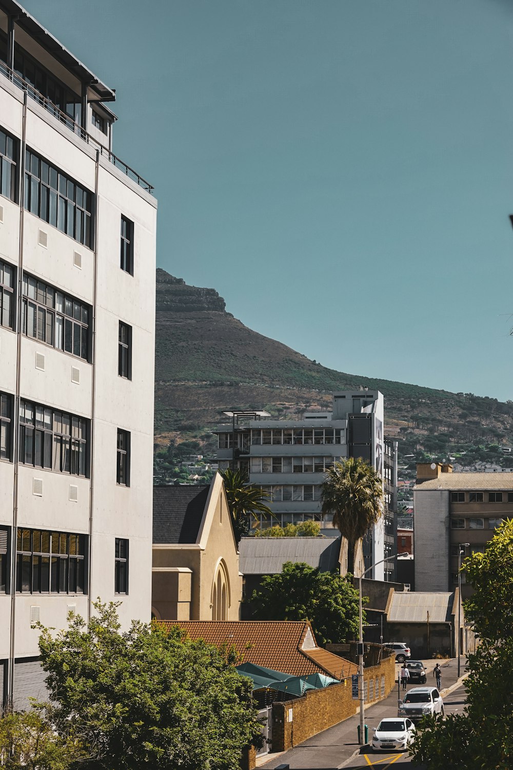 a city with a hill in the background