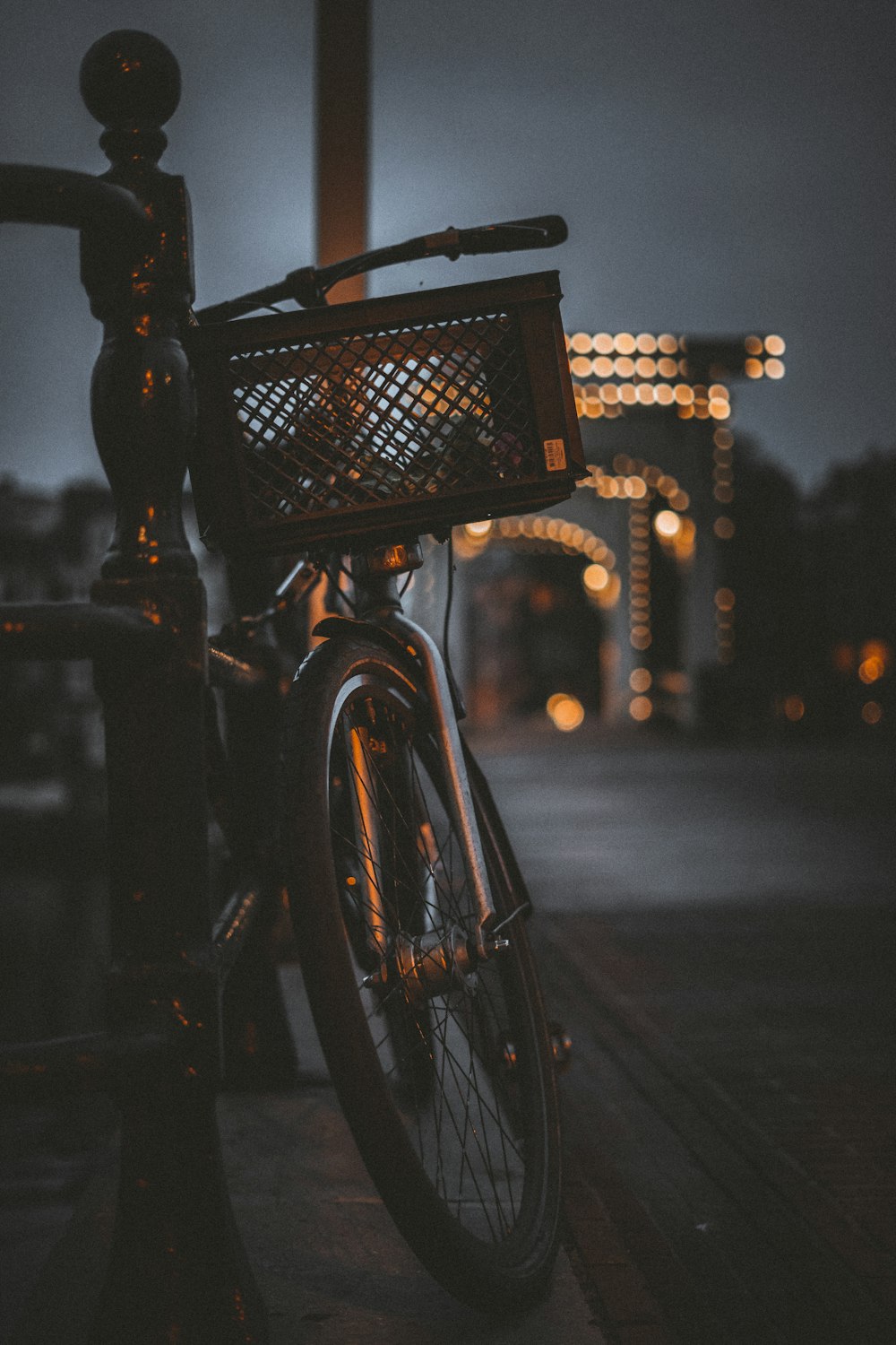 a person holding a basket on a bicycle