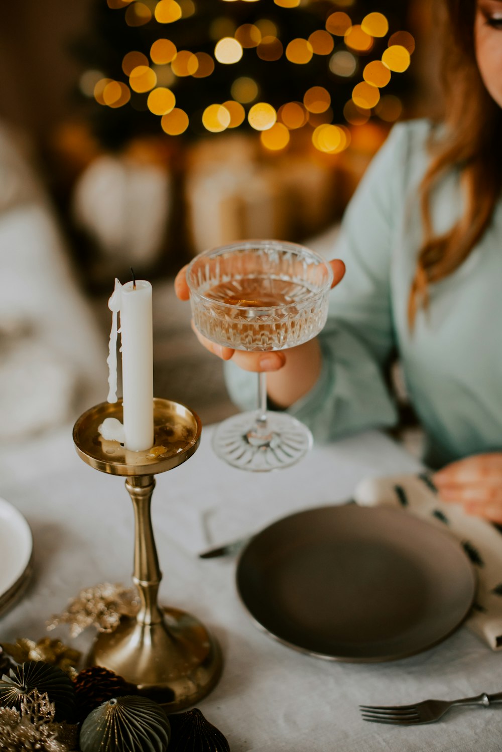 a woman holding a glass of champagne