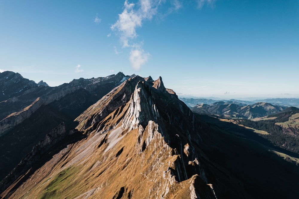 a mountain with a valley below