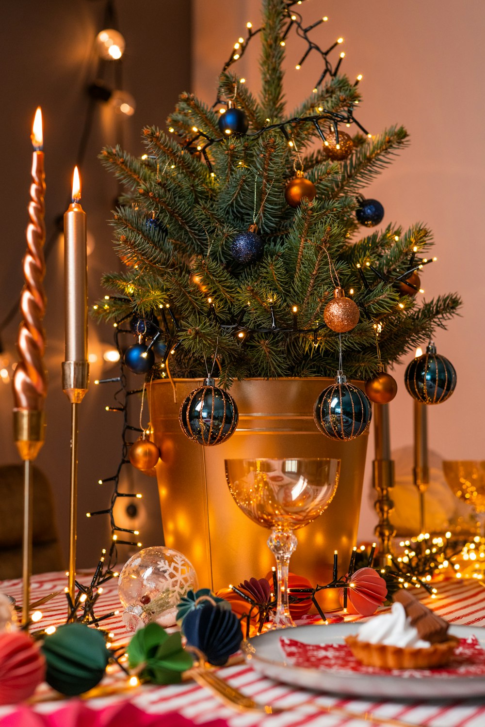 a christmas tree with candles and food