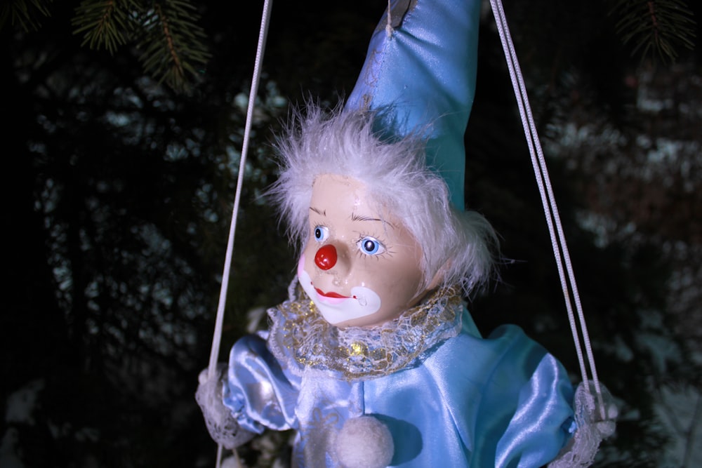 a doll on a swing