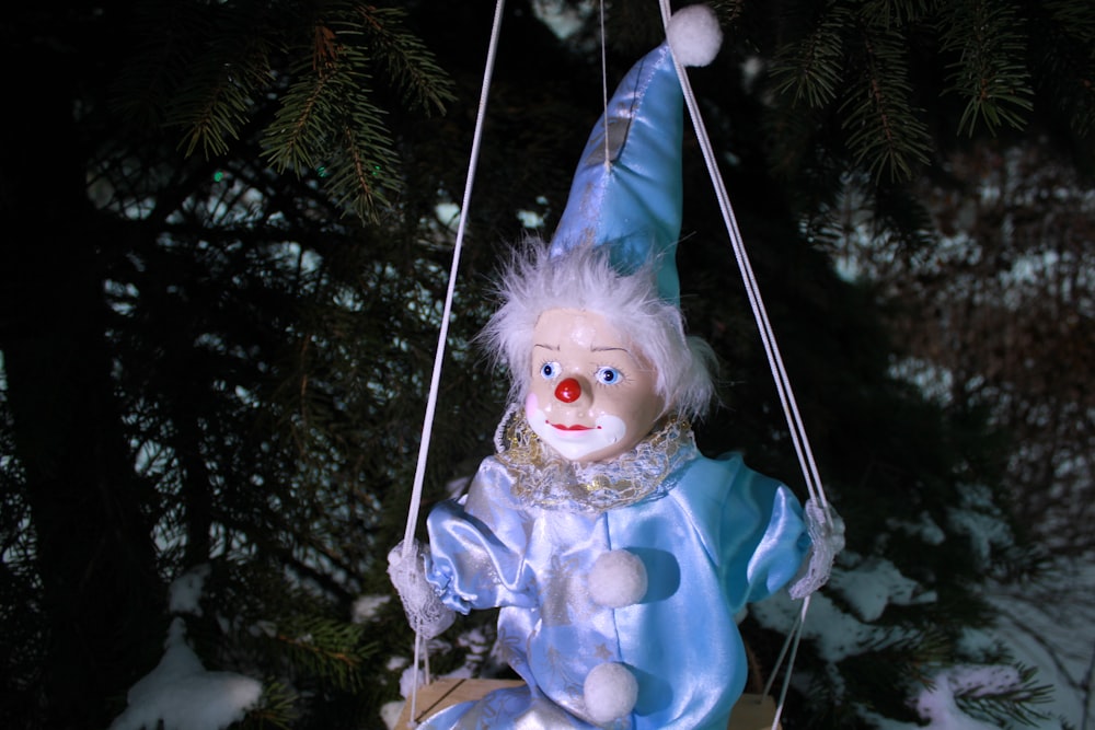 a doll on a swing