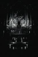 A softly lit altar with candles, crystals, and spiritual tools glowing in warm golden light.