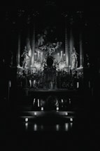 A serene altar with candles and mystical symbols glowing softly in the dark