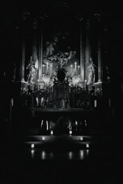 A mystical altar with candles and herbs glowing softly in dim light.