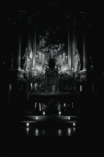 A mystical altar adorned with candles, crystals, and ancient runes glowing softly in twilight.