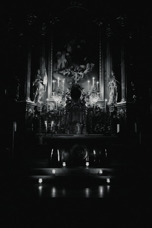 A serene altar with candles, crystals, and spiritual symbols glowing softly in a dim room.