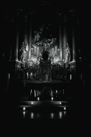 A peaceful altar setup featuring exclusive religious items from Luz do Altar, softly illuminated by candle flames.