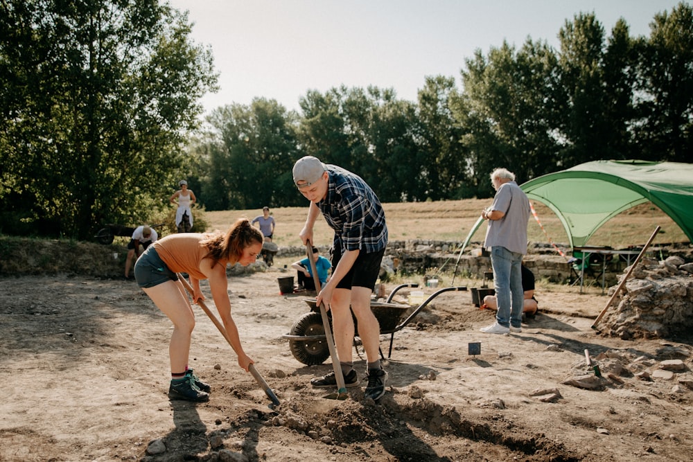 a group of people working outside