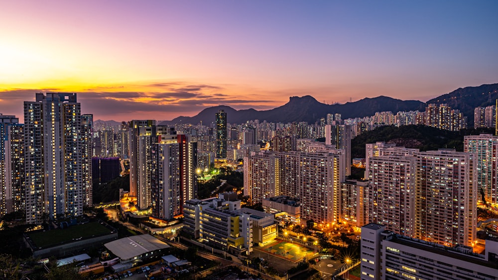 a city with mountains in the background