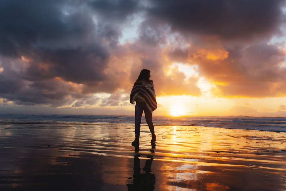 a person standing on a beach