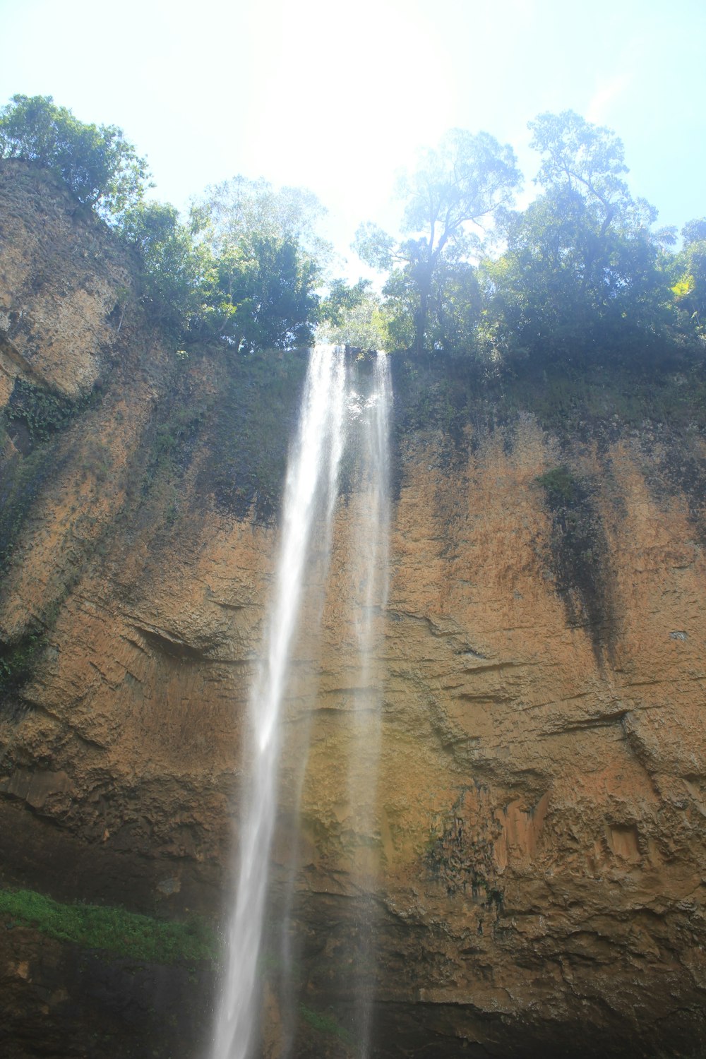 a waterfall over a cliff