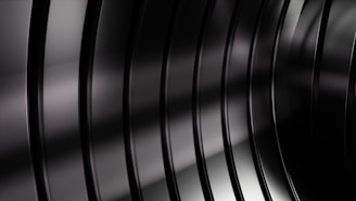 Sleek metal finishes reflecting soft light, emphasizing precision and quality.