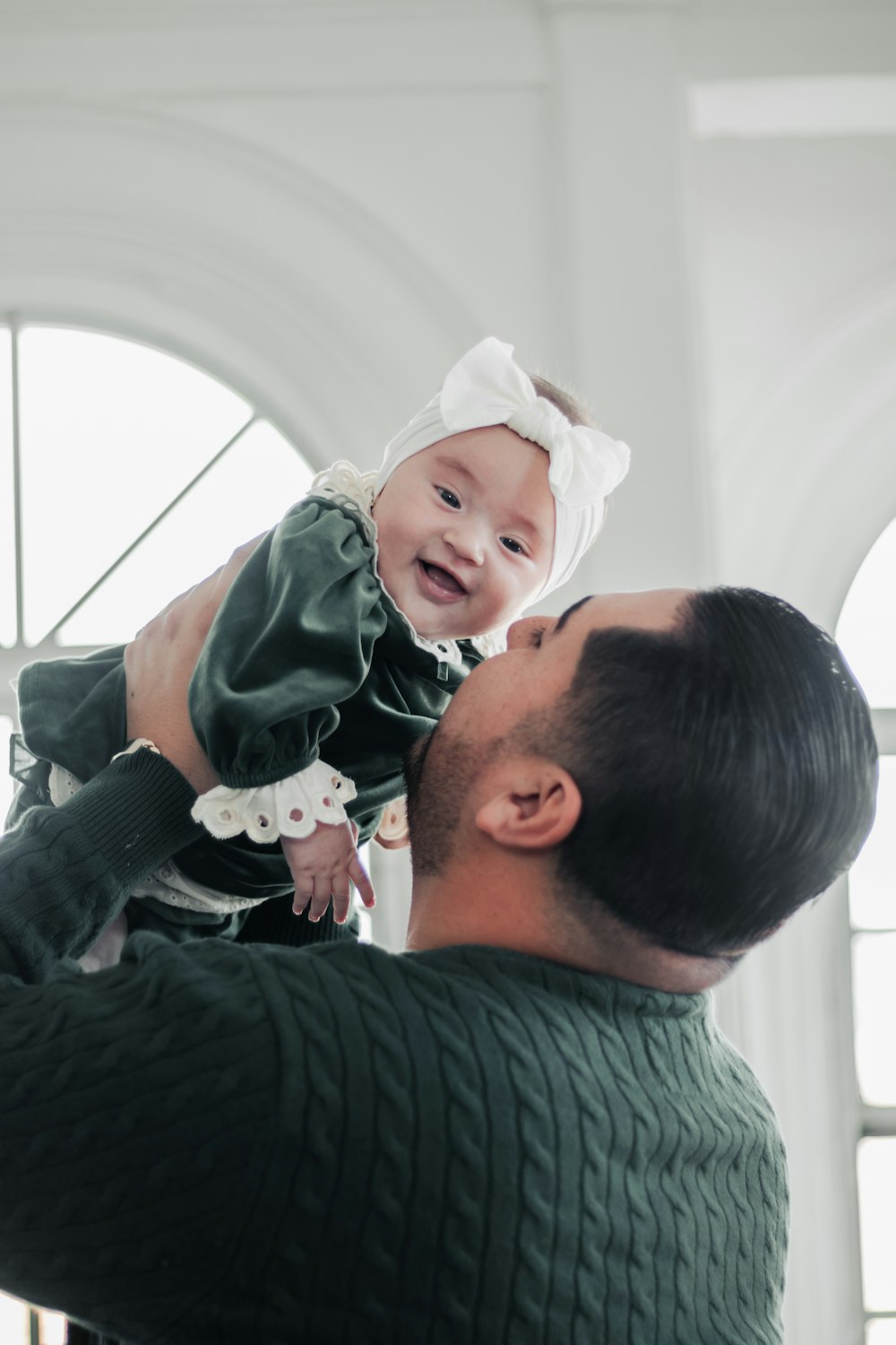 a person holding a baby