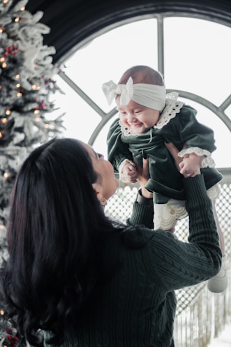 a person holding a baby