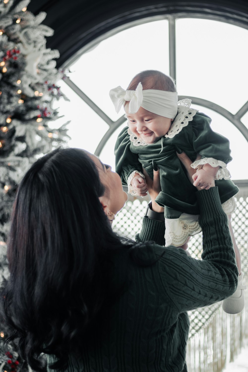 a person holding a baby