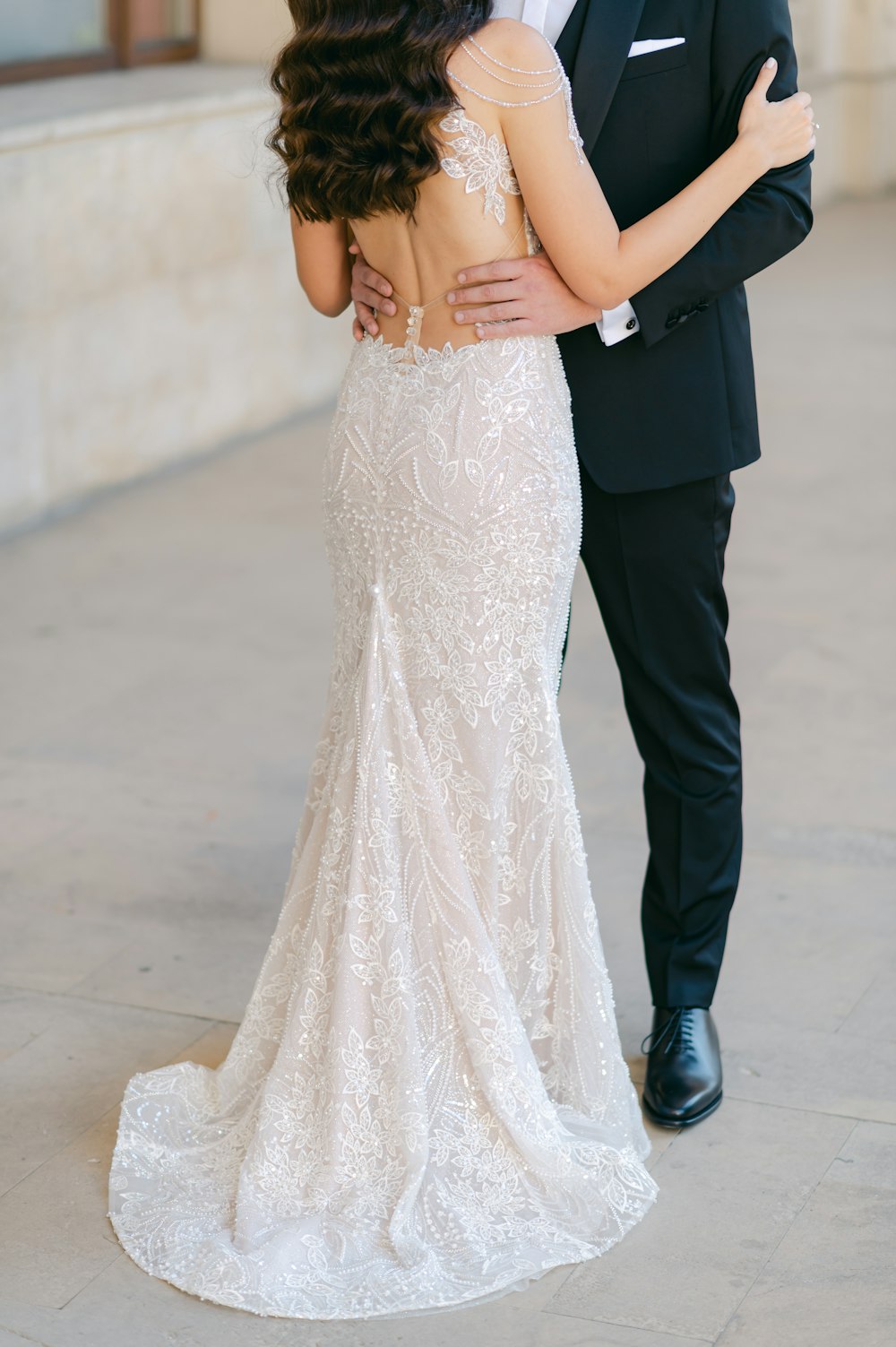 a man and woman in formal wear