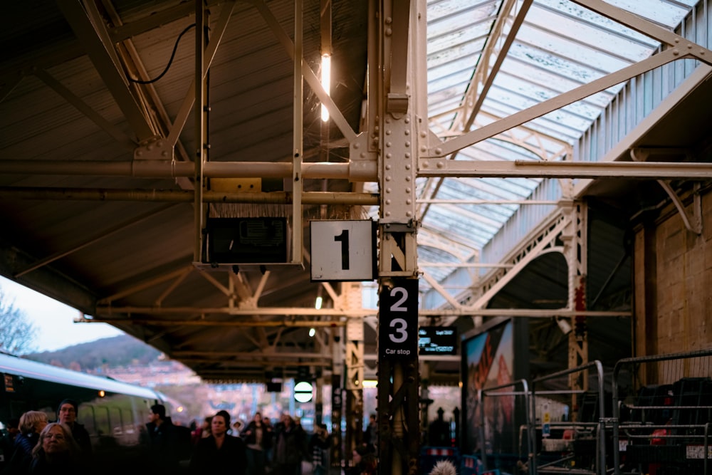 a train station with a large group of people