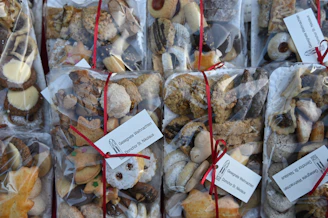 A selection of custom door gifts including cookies and coffee bags wrapped neatly.