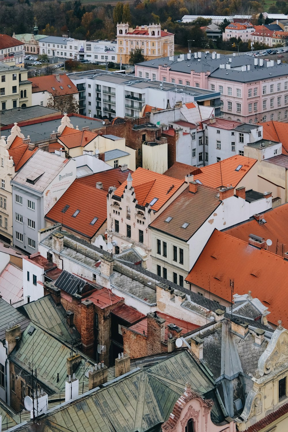 a group of buildings with roofs