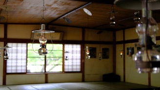 A beautifully lit traditional Japanese-style room showcasing electrical fixtures.