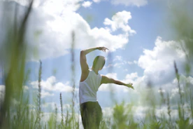 a man standing in a field