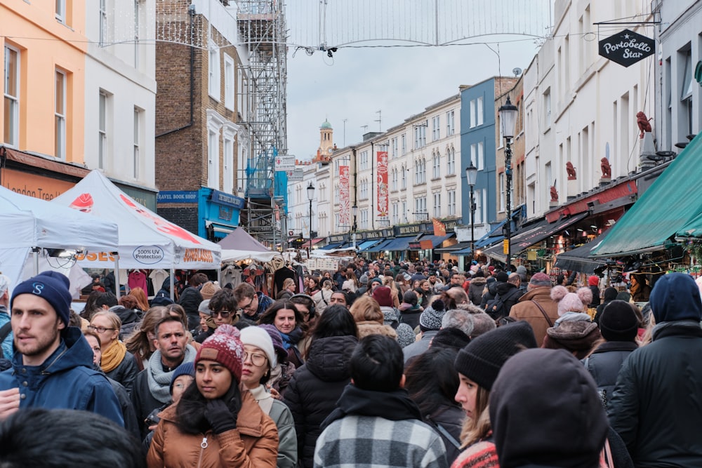 a crowd of people in a street