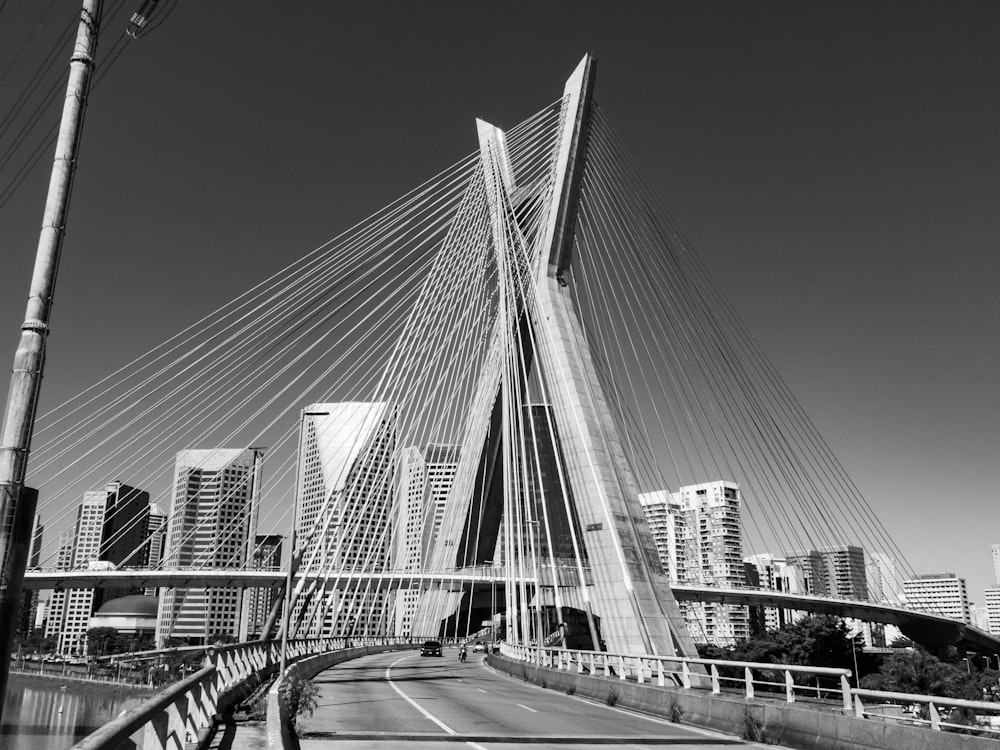 a bridge with a road and buildings