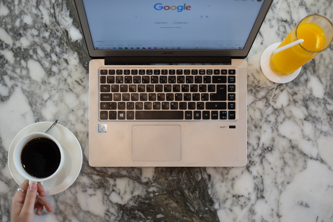 graphical user interface, Top down shot computer with coffee