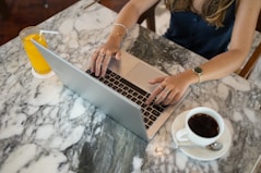 a woman using a laptop