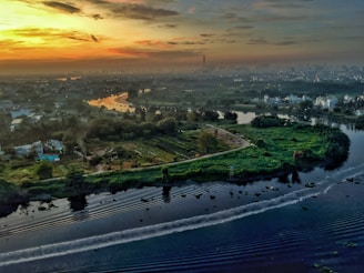 Scenic view of the Yangtze River winding through Chongqing's skyline at dusk.