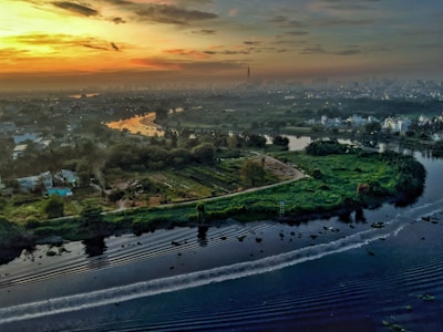 Scenic view of the Yangtze River winding through Chongqing's skyline at dusk.