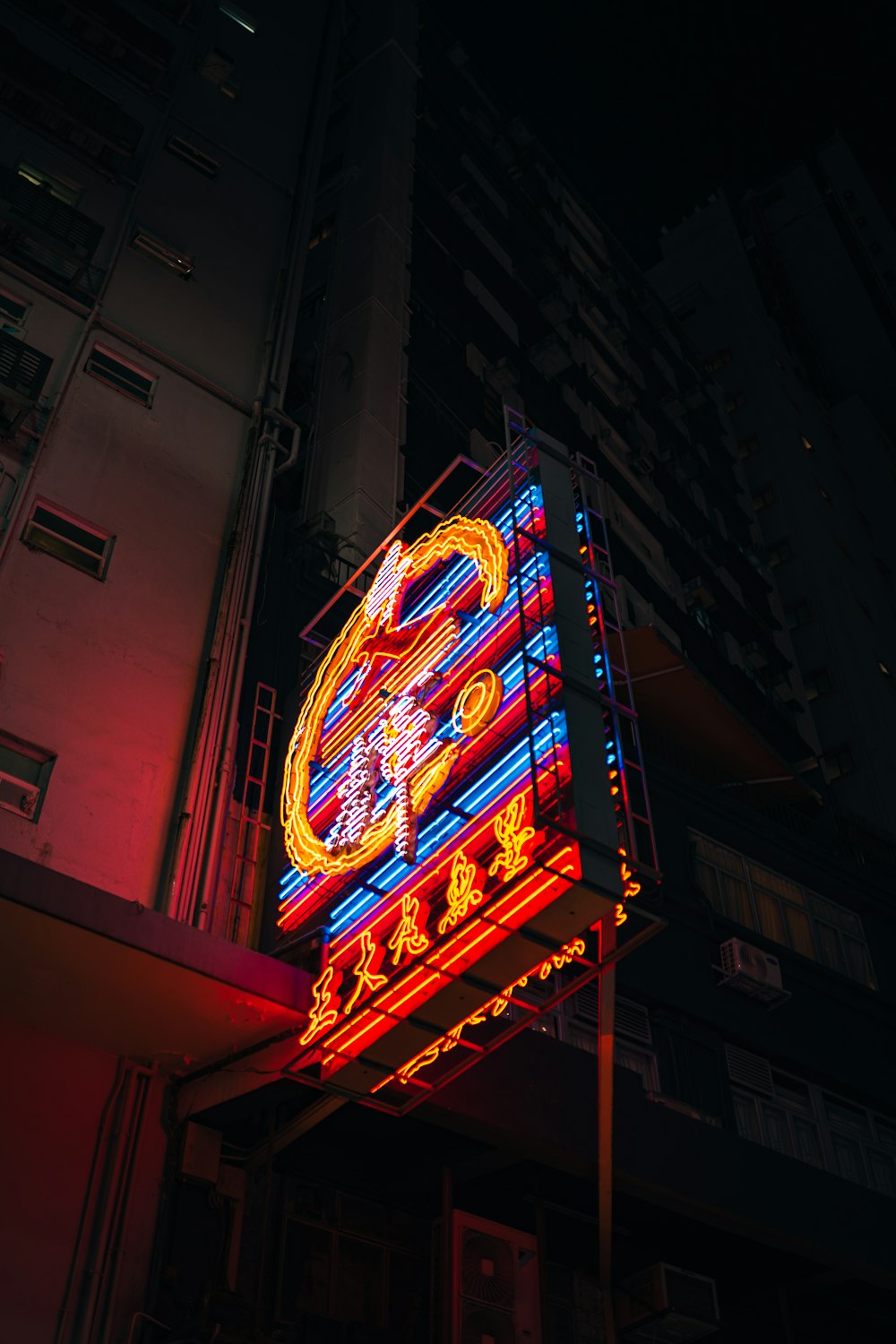 a lighted sign on a building