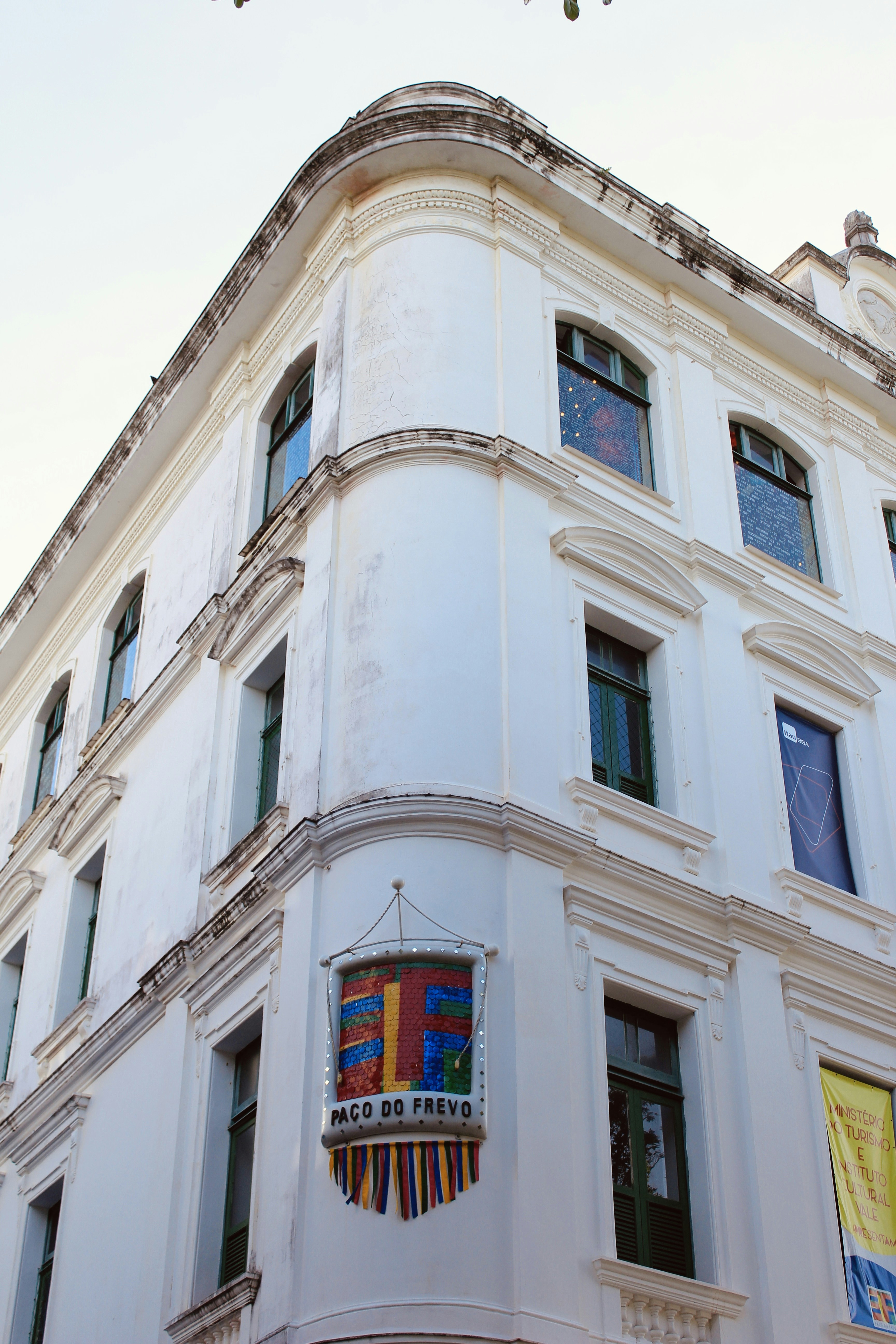 a building with flags on the outside