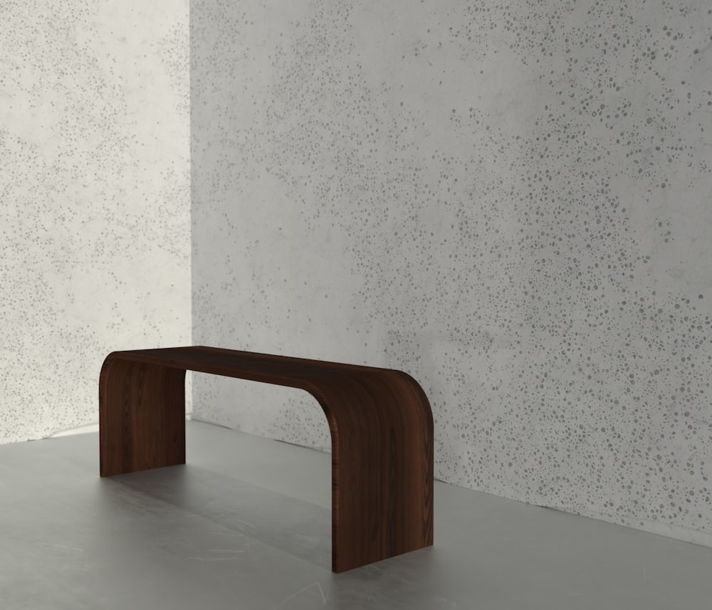 a wooden bench in a room
