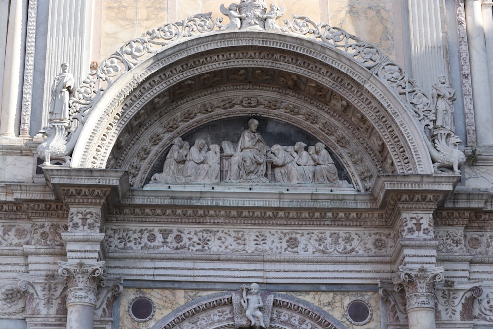 a building with statues on the side