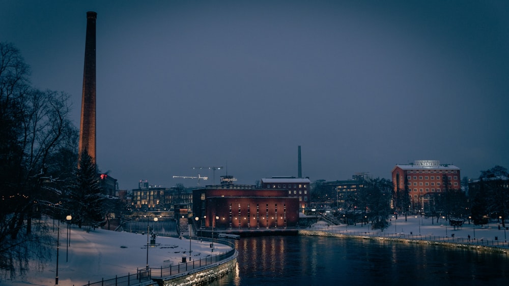 a city with a river and a tower