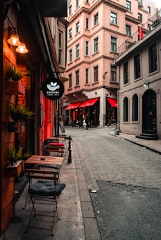 A cozy street in Porto with colorful buildings and a small café.