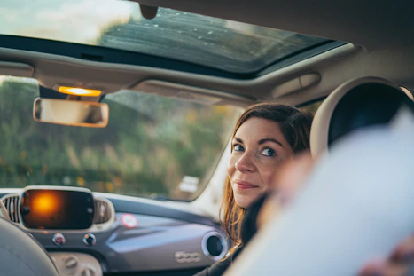 a woman driving a car