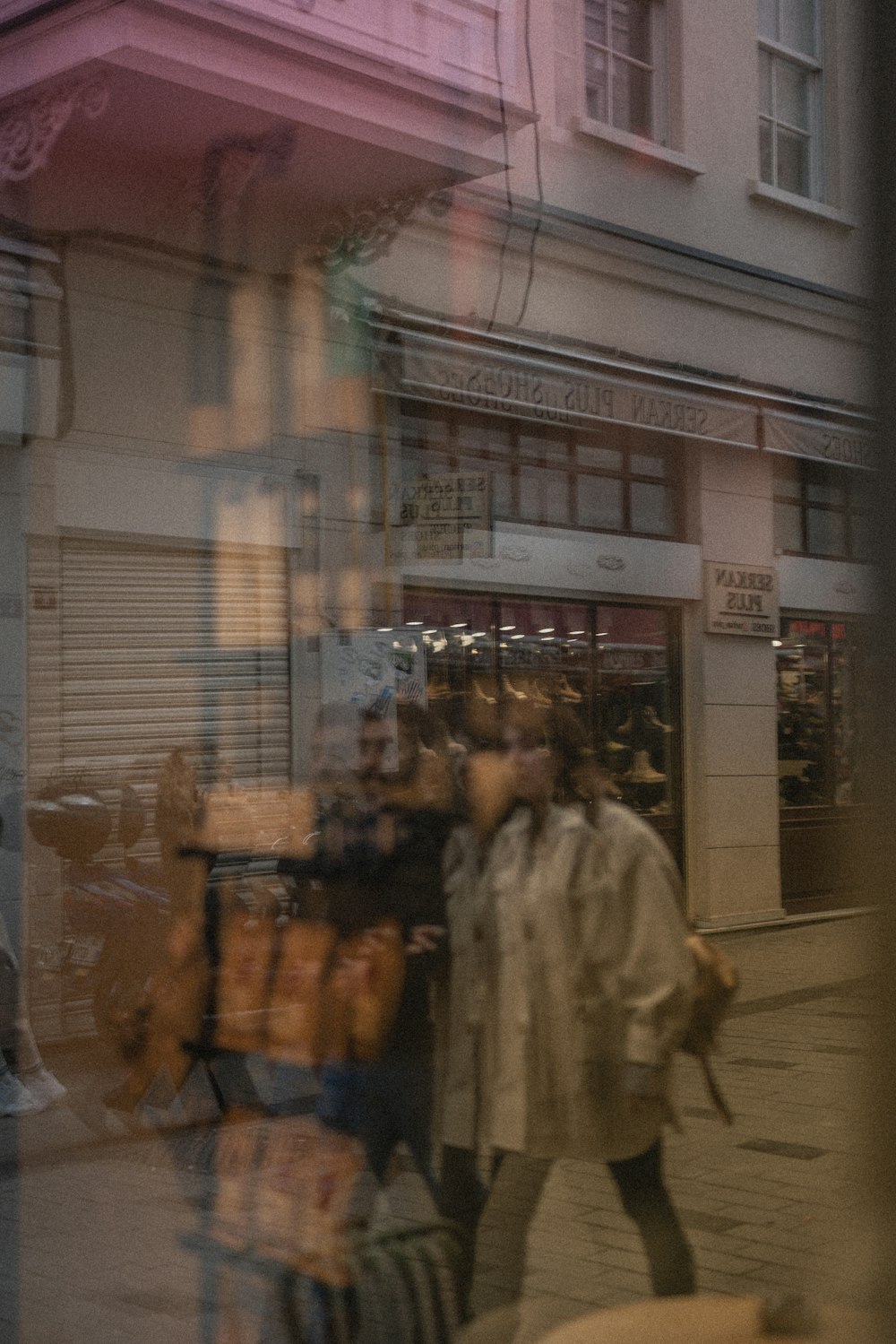 a person walking past a store