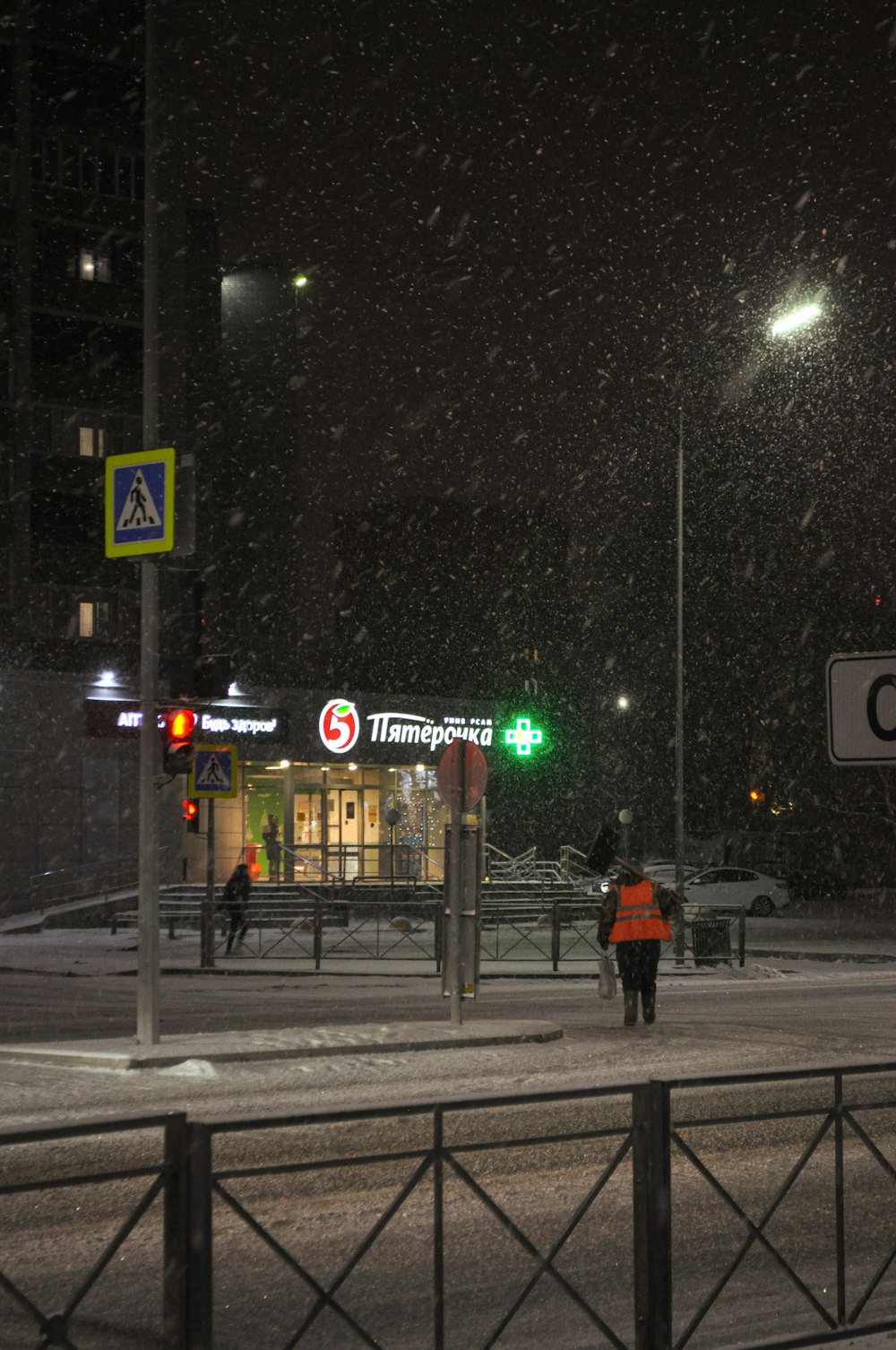 a person walking on a sidewalk