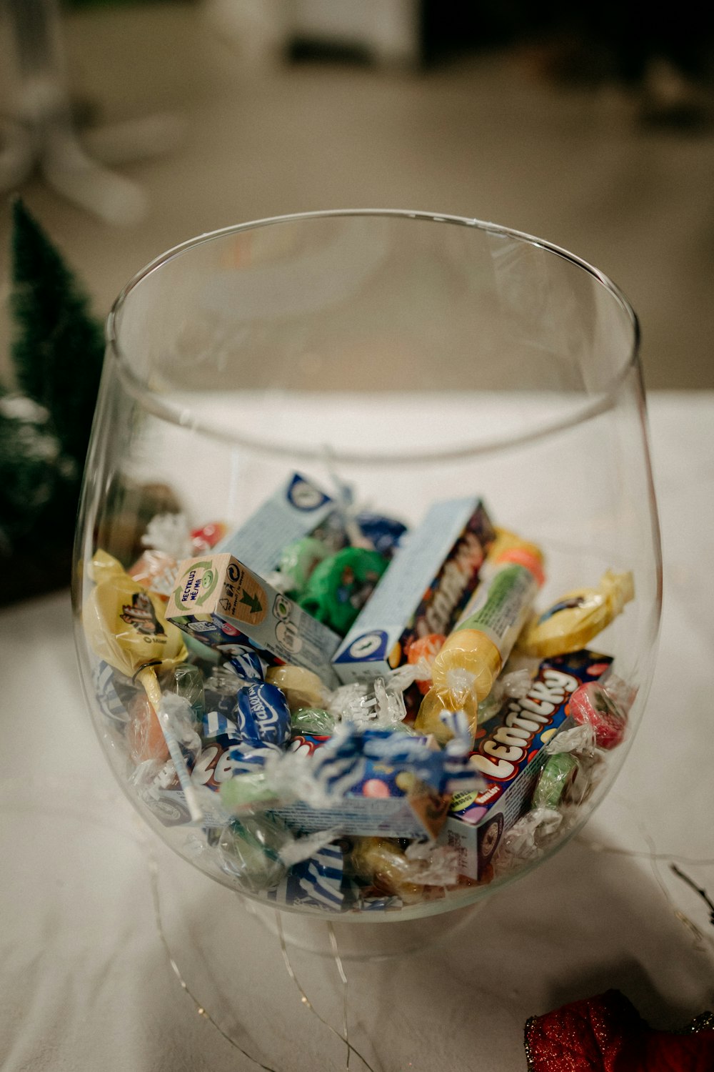 a plastic container with candy in it