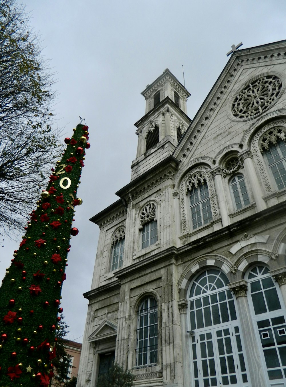 a building with a tower and decorations