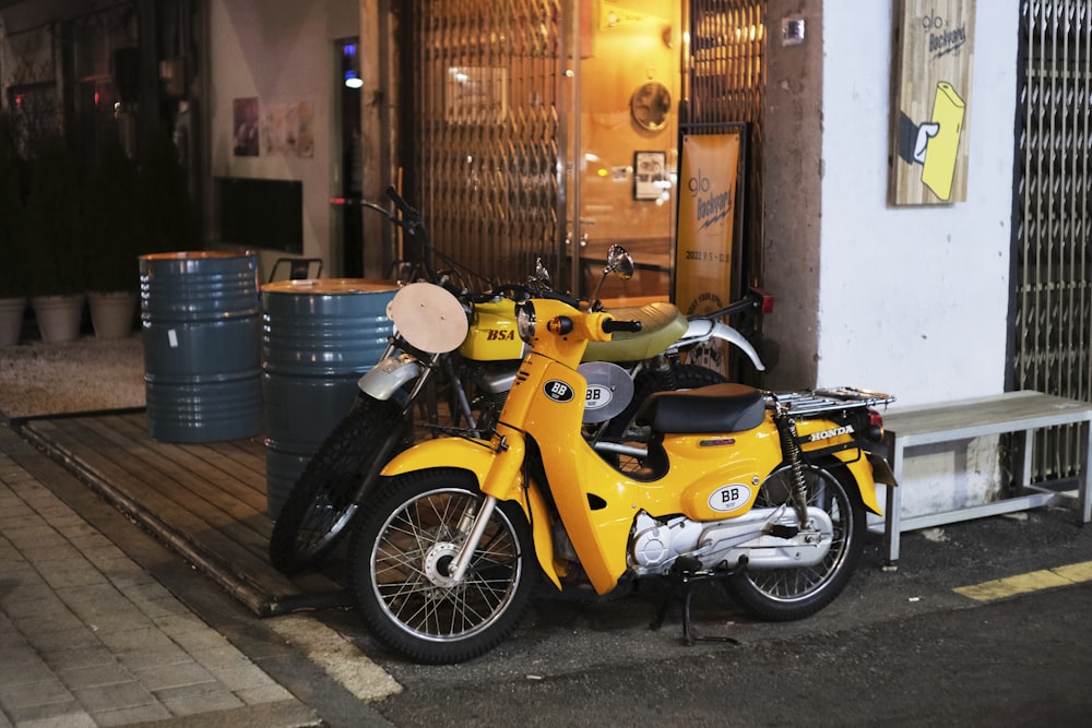 a yellow motorcycle parked on the side of a street
